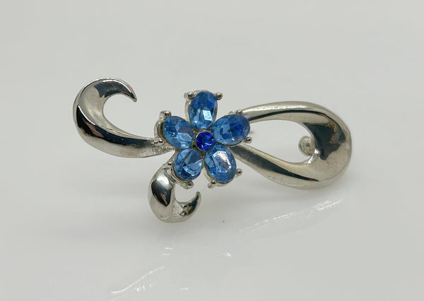 Vintage Silver Bow Brooch with Blue Stones - Lamoree’s Vintage