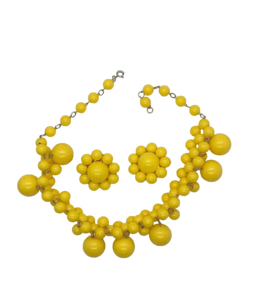 Yellow bead necklace on a white background