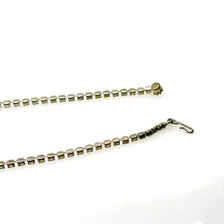 A silver-toned metal chain necklace with a lhook clasp, shown on a plain white background.