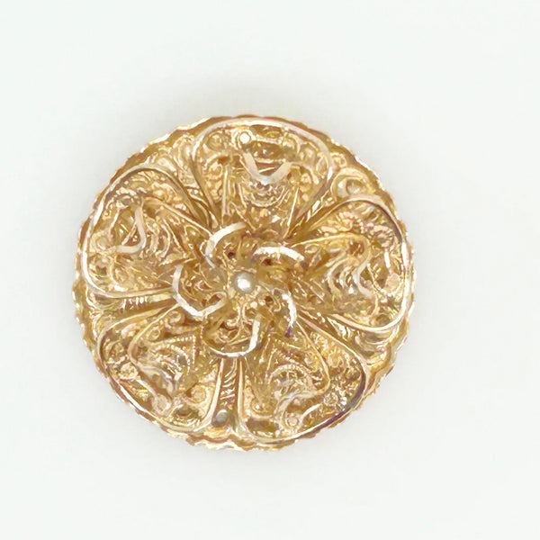 This exquisite scarf clip showcases delicate, finely crafted filigree work with layered, ruffled details resembling floral or ribbon motifs. Measuring 1.5" in length, it carries the distinguished signature of W. Germany, making it a unique and elegant accessory.