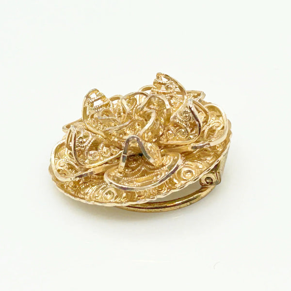 This exquisite scarf clip showcases delicate, finely crafted filigree work with layered, ruffled details resembling floral or ribbon motifs. Measuring 1.5" in length, it carries the distinguished signature of W. Germany, making it a unique and elegant accessory.