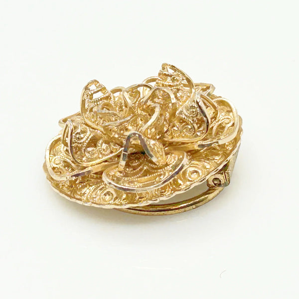 This exquisite scarf clip showcases delicate, finely crafted filigree work with layered, ruffled details resembling floral or ribbon motifs. Measuring 1.5" in length, it carries the distinguished signature of W. Germany, making it a unique and elegant accessory.