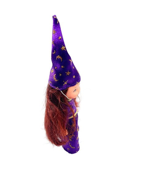 1999 Mattel Kelly Club "Wizard Melody" doll, part of the Li'l Friends of Kelly collection.The doll is featured wearing a purple wizard costume adorned with gold stars and moons.