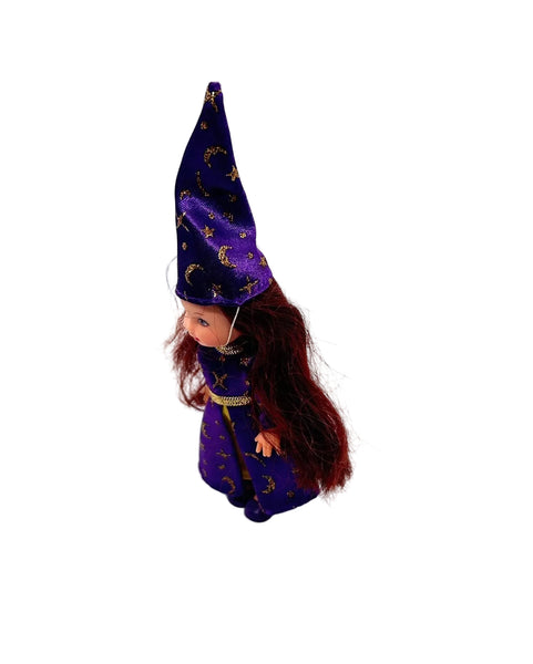 1999 Mattel Kelly Club "Wizard Melody" doll, part of the Li'l Friends of Kelly collection.The doll is featured wearing a purple wizard costume adorned with gold stars and moons.