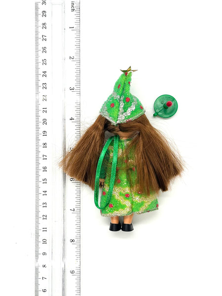 Discover the enchanting 2001 Mattel Barbie Kelly Club "Christmas Tree Chelsie" doll, a cherished piece from a delightful holiday series.