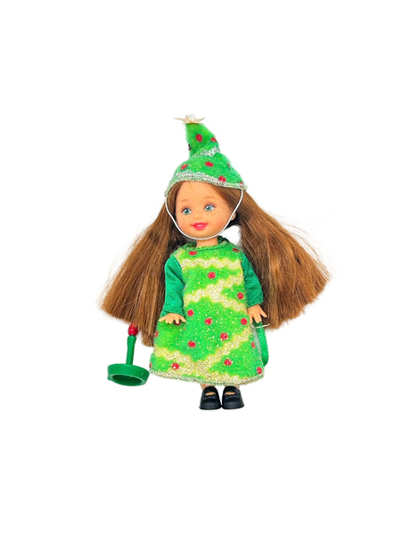 Discover the enchanting 2001 Mattel Barbie Kelly Club "Christmas Tree Chelsie" doll, a cherished piece from a delightful holiday series.